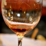 Supposedly the wine dripping down inside the glass are legs.