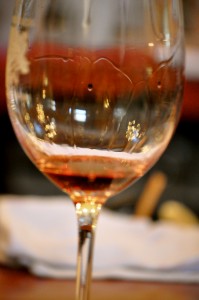 Supposedly the wine dripping down inside the glass are legs.